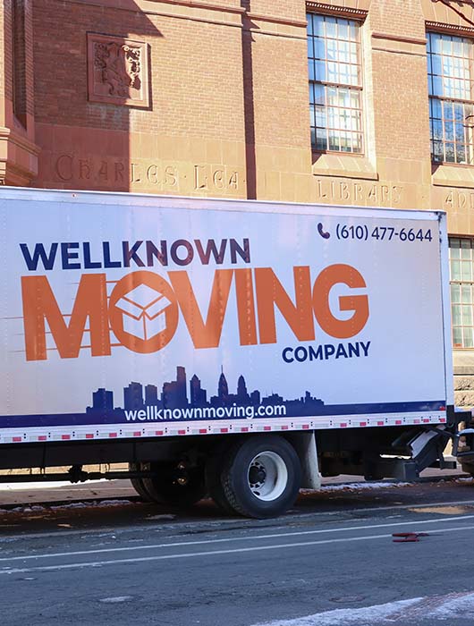 WellKnown Moving Company truck near Fisher Fine Arts Library