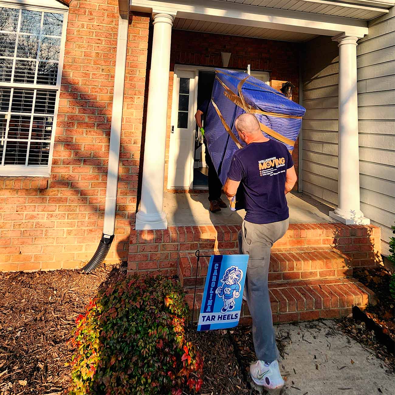 Our movers moving sofa